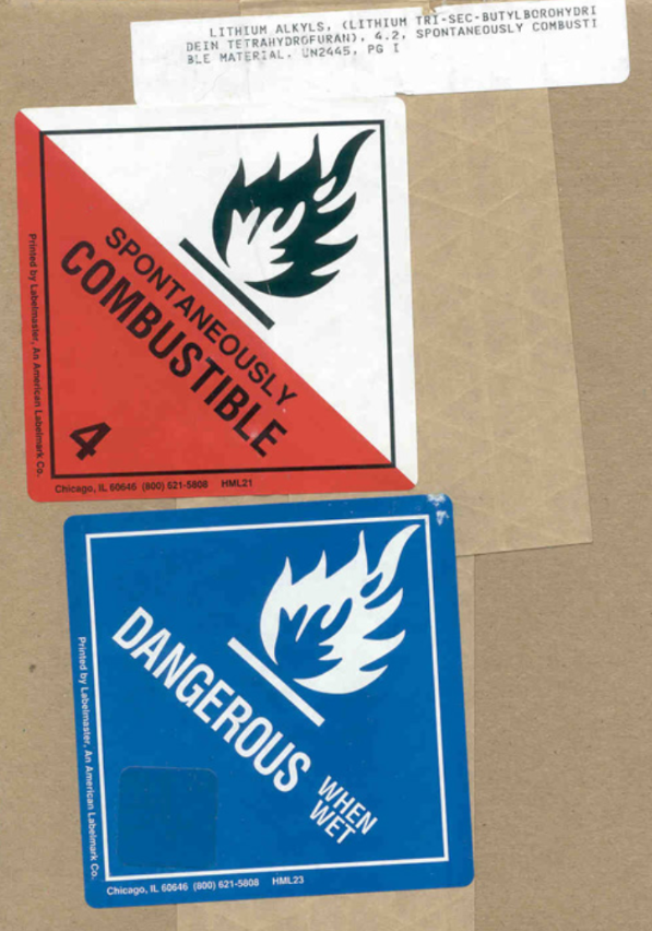 Labels stating "Spontaneously Combustible" and "Dangerous when wet"