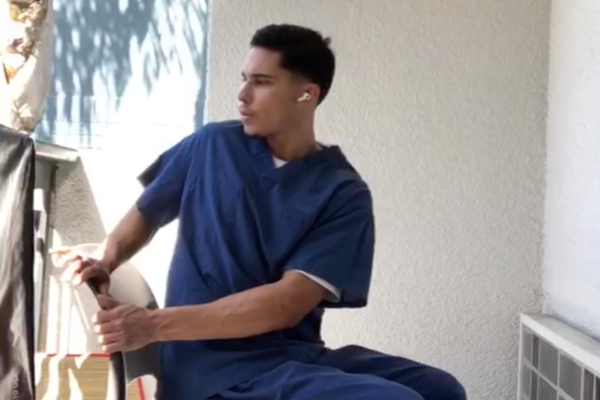 student stretching on chair