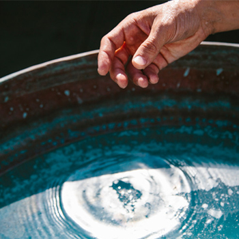 Pebble dropping in water
