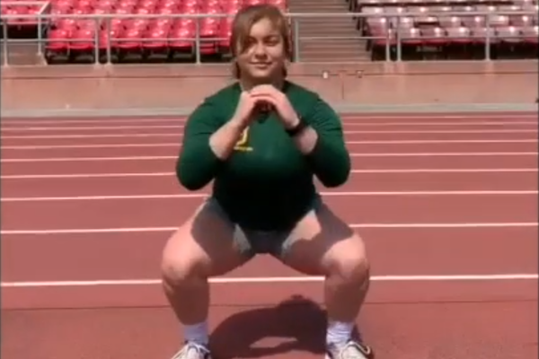 trainer squatting