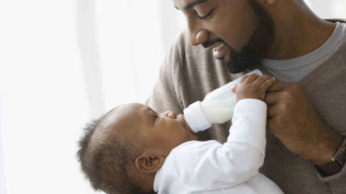 Dad holding baby