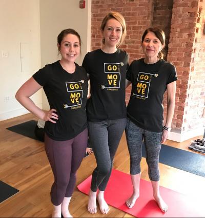 The AJCU team pose after doing a yoga class