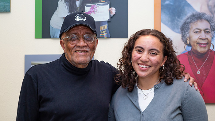 student smiles with San Francisco resident