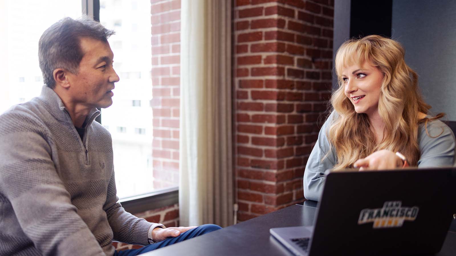 Professor and student talking