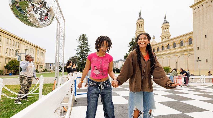 Two students roller skating