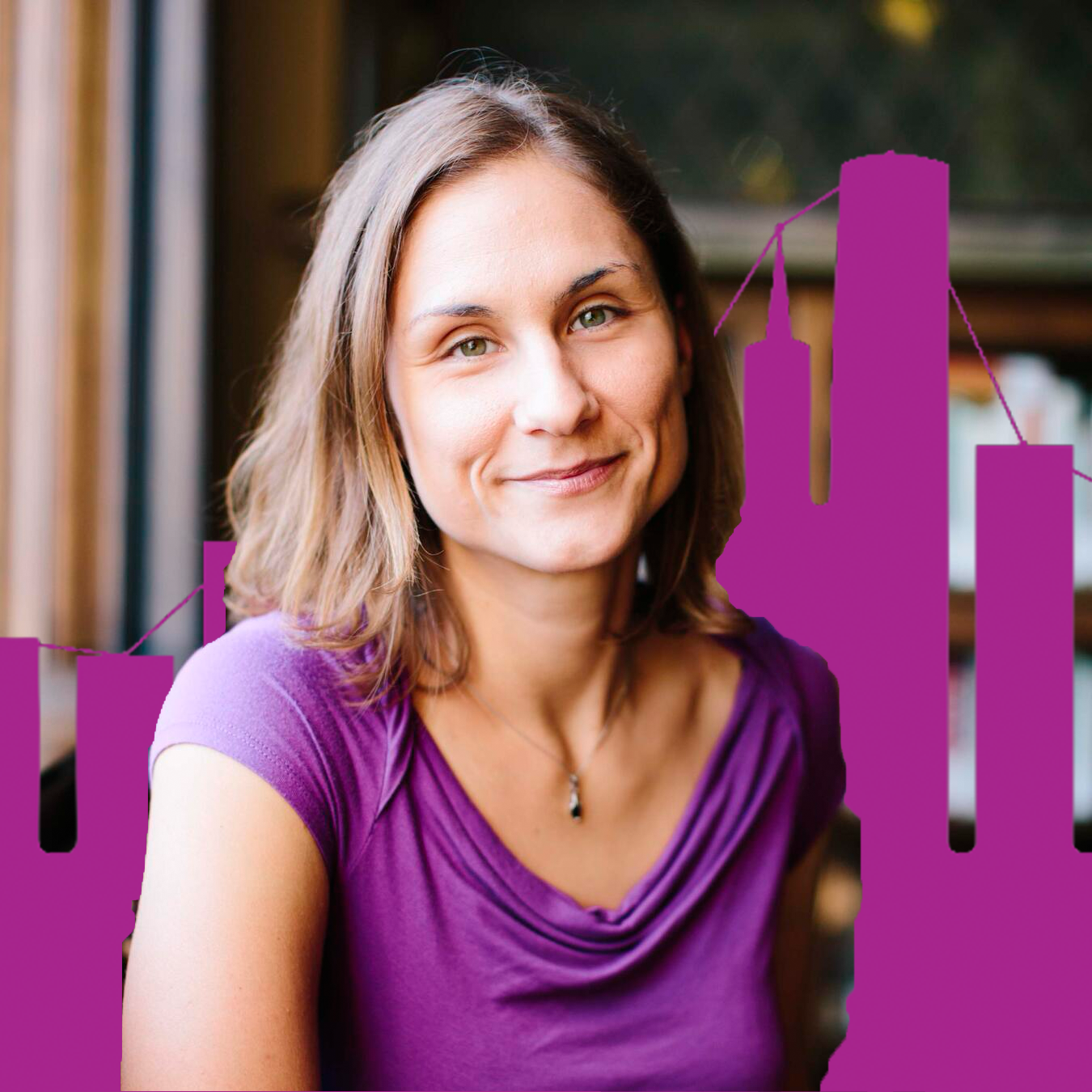 Headshot of Amalia Kokkinaki with purple buildings in the background