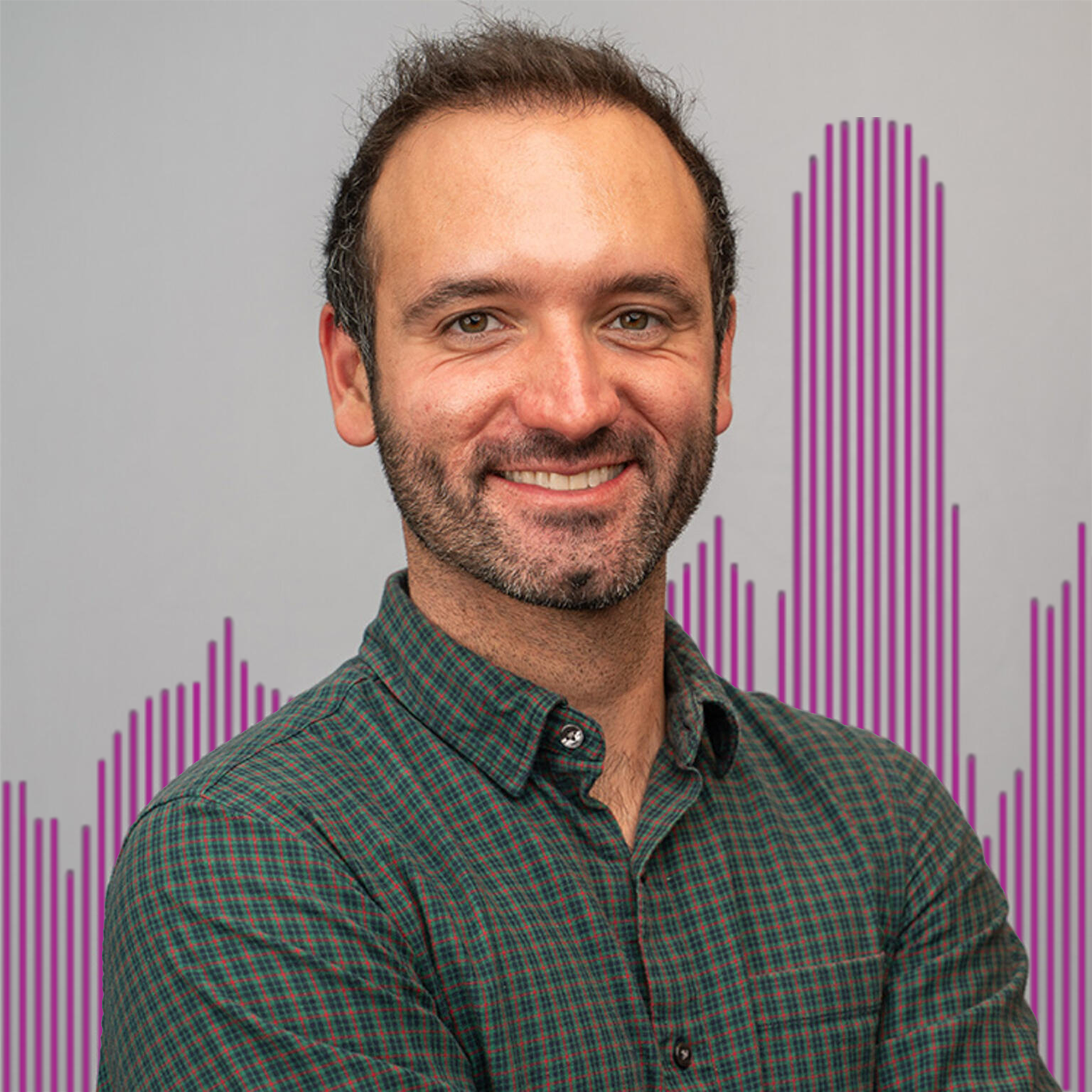 Headshot of Arman Khachiyan with purple lined buildings in the background