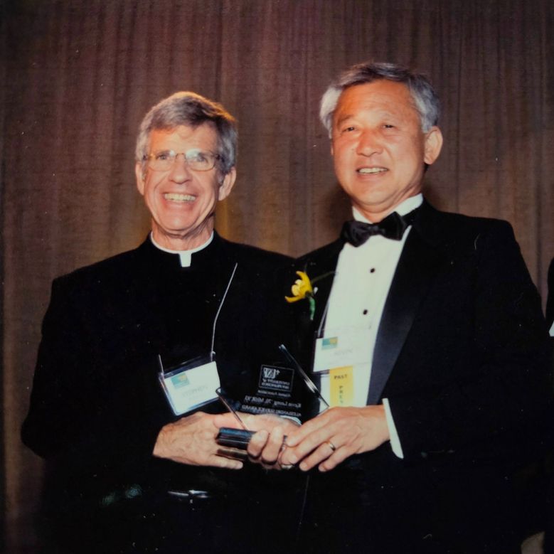 Kevin Leong ‘70, ‘93 with former President, Rev. Stephen A. Privett, S.J.