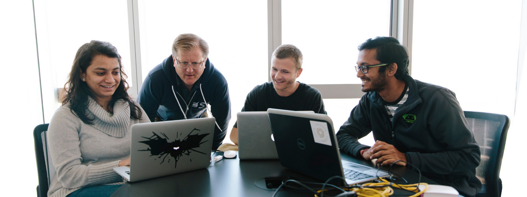 Professor Gregory Benson teaches a small group of students