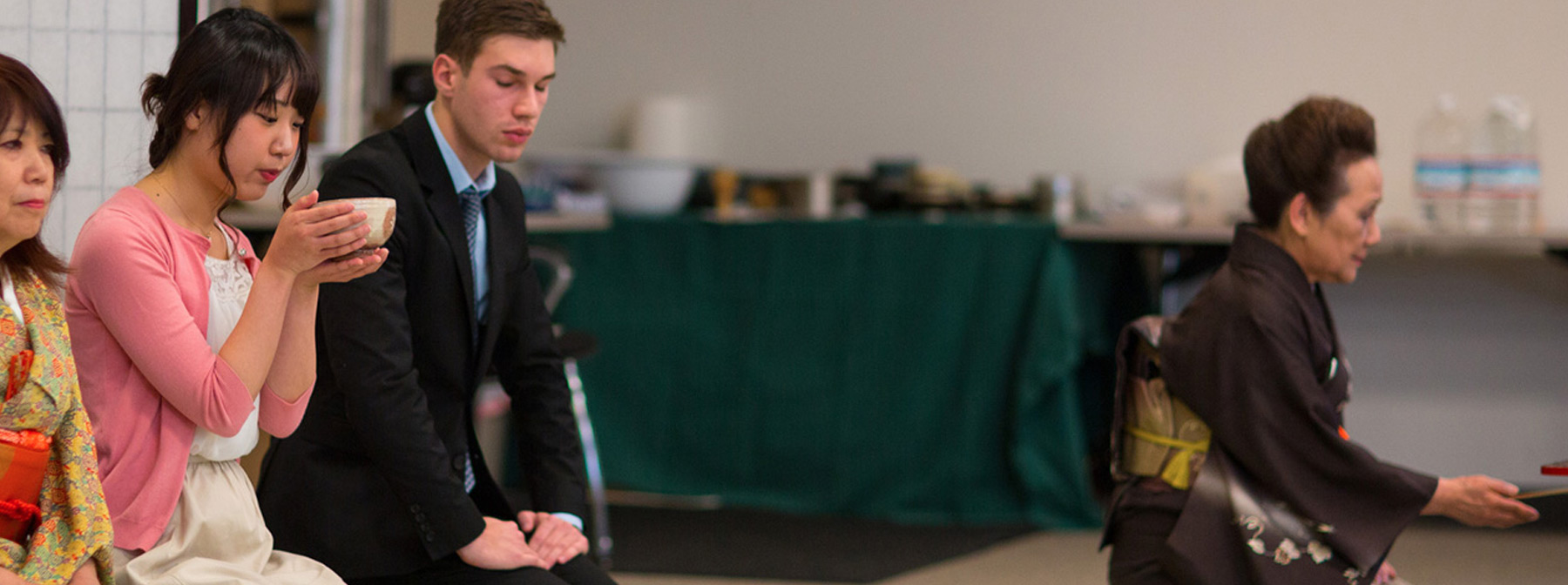 Student participates in the Japanese tea ceremony