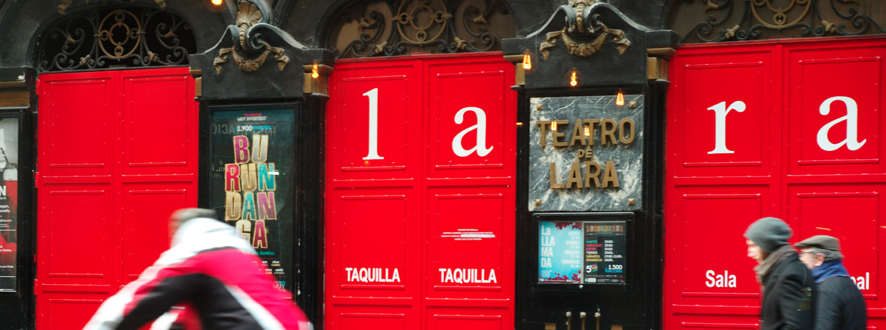 The bright red doors of Teatro de Lara
