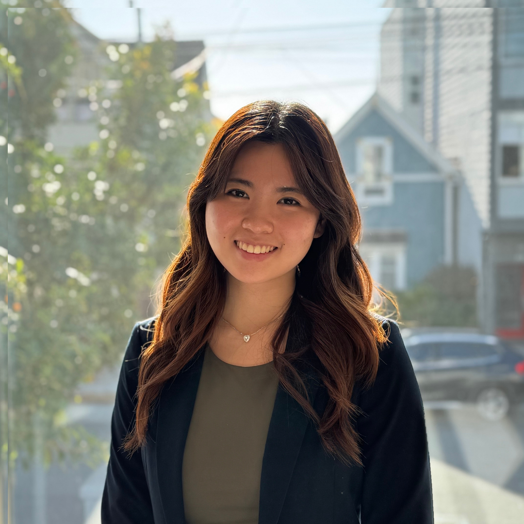 picture of a girl wearing black jacket and grey shirt