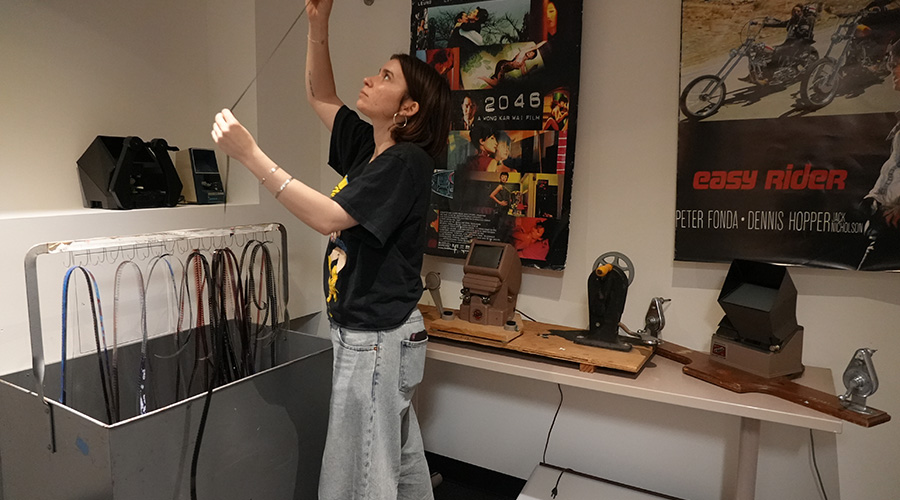 Student holding film