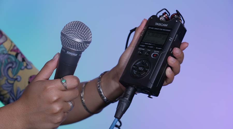 Student holding microphone