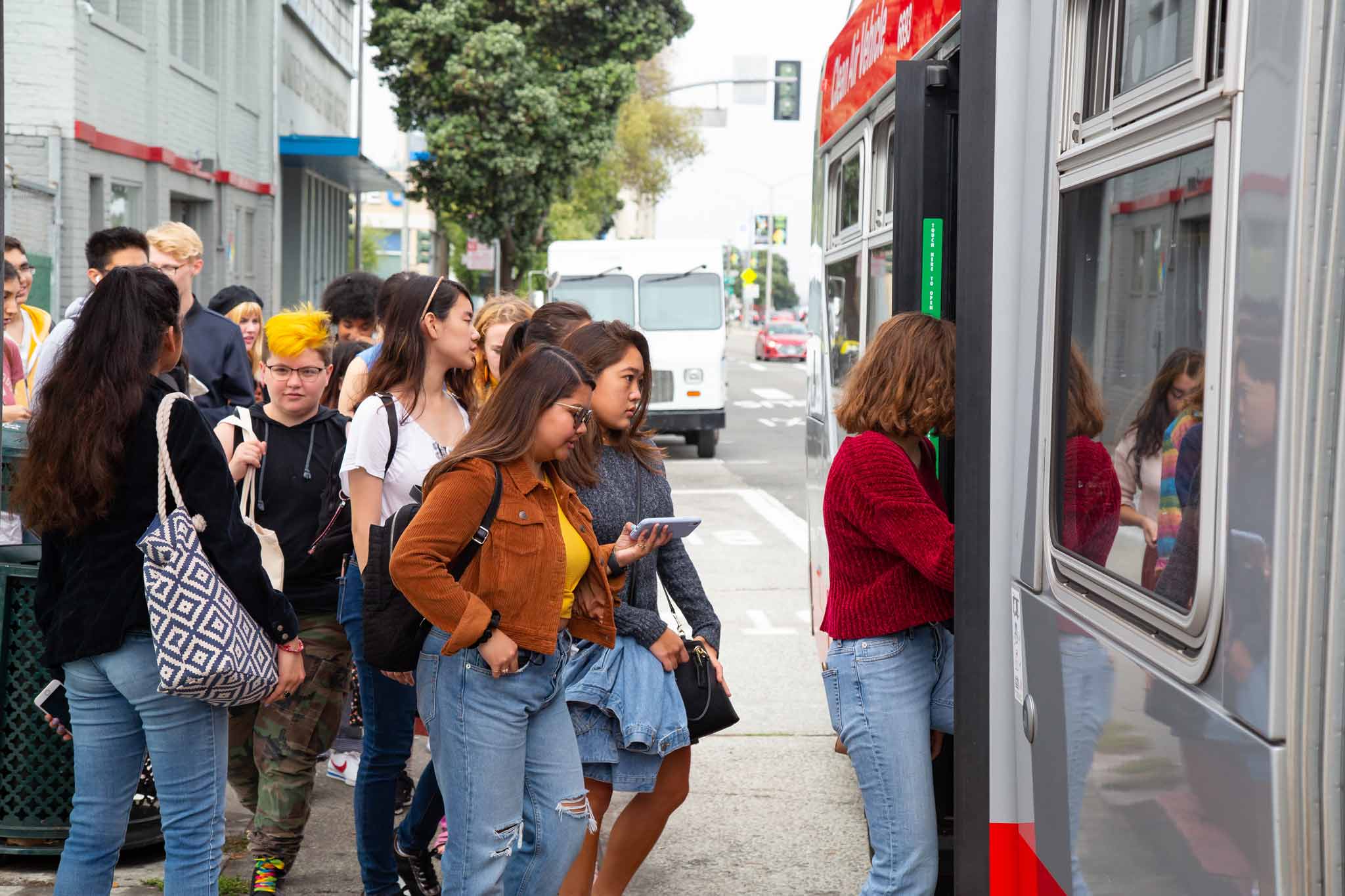 students boarding a bus