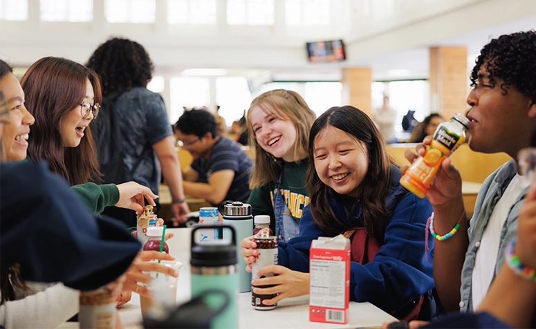 Students sitting together in lunch room