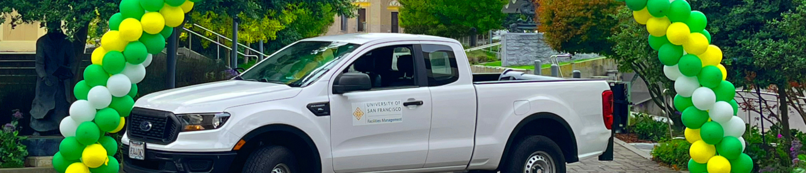 Facilities truck under ballon arch