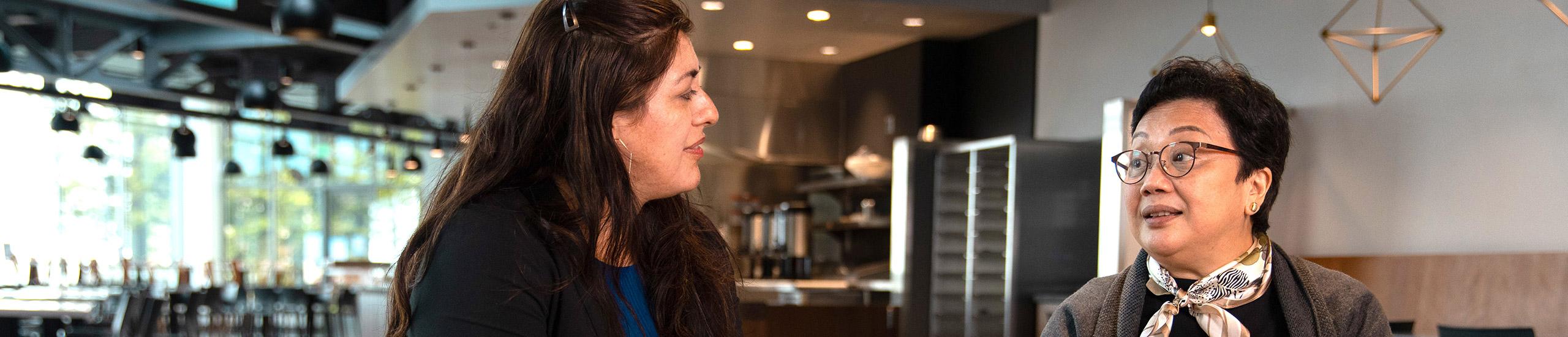 Faculty speaking together at Koret Lodge