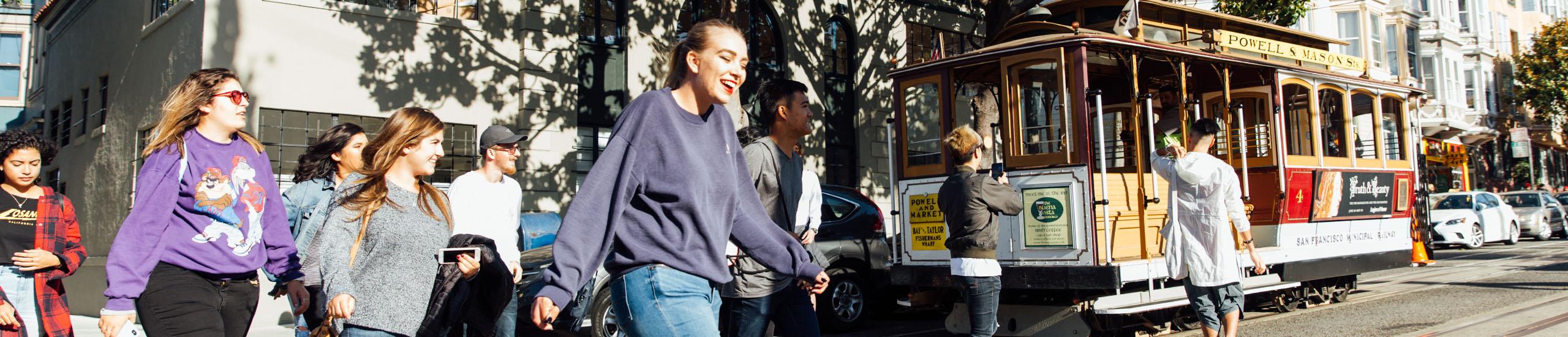 Students near an SF Tram