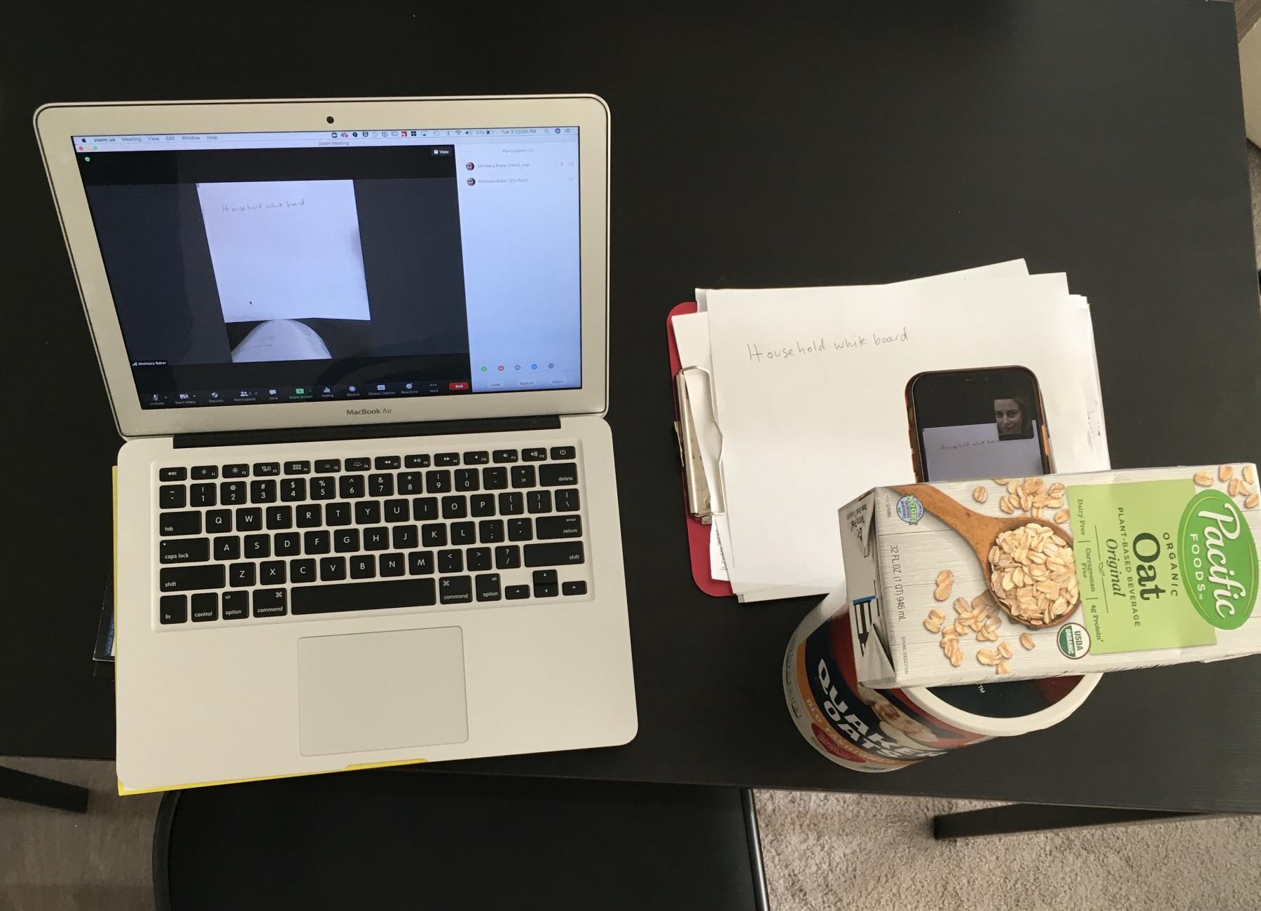 iPhone on top of a box of oats as a document camera