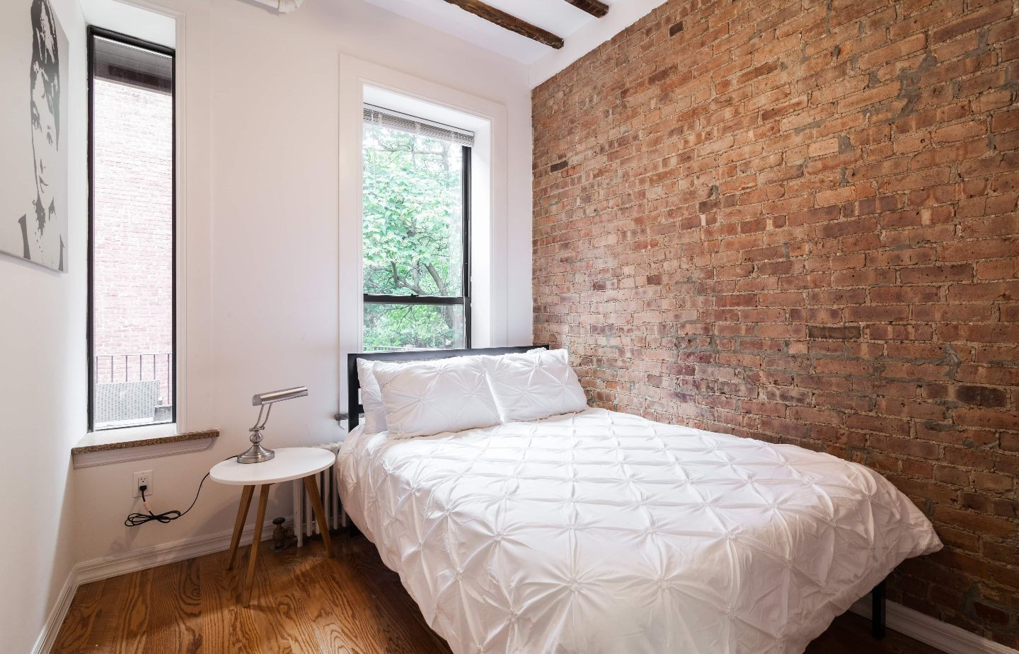 Bedroom with white bed