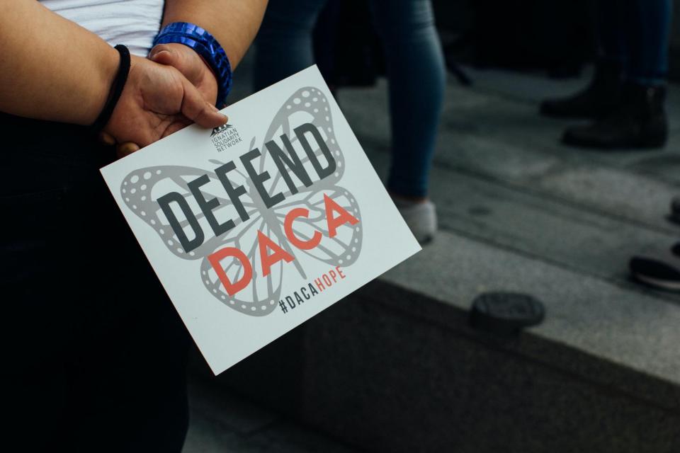 Sign reading defend DACA