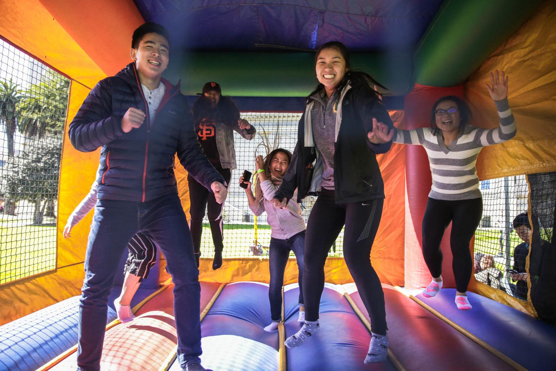 Students in bounce house