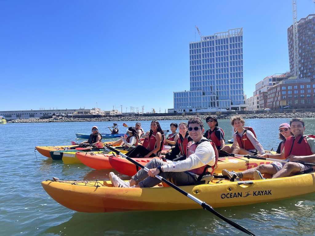 group of students on kayak in china basin