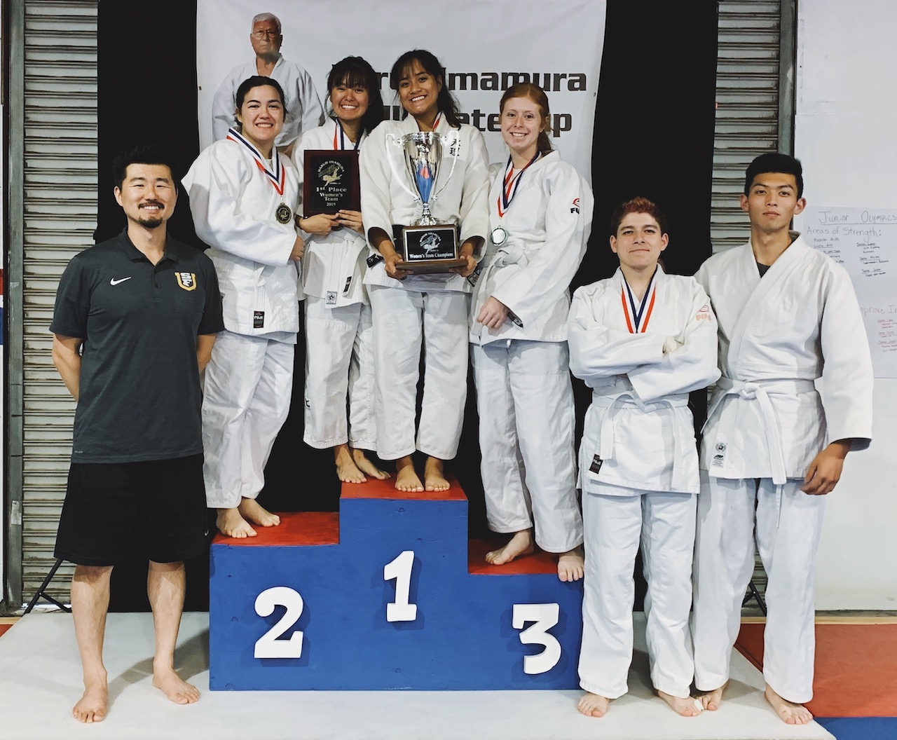judo participants on podium