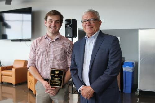 Chemistry student Aiden Batchelor with Mark Lowman, 2025