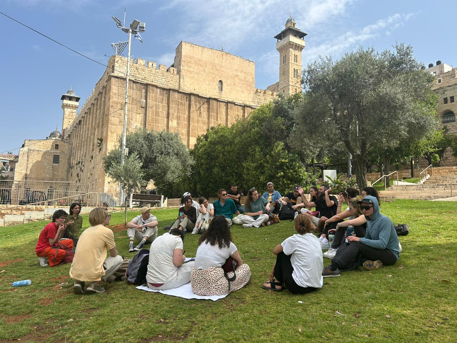 students outside the cave of the patriarchs