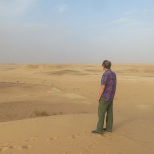 man in Sahara Desert