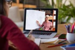 person watching a Zoom webinar