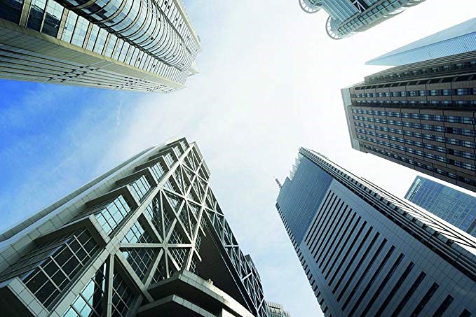 Picture of the Sky looking up to 4 buildings