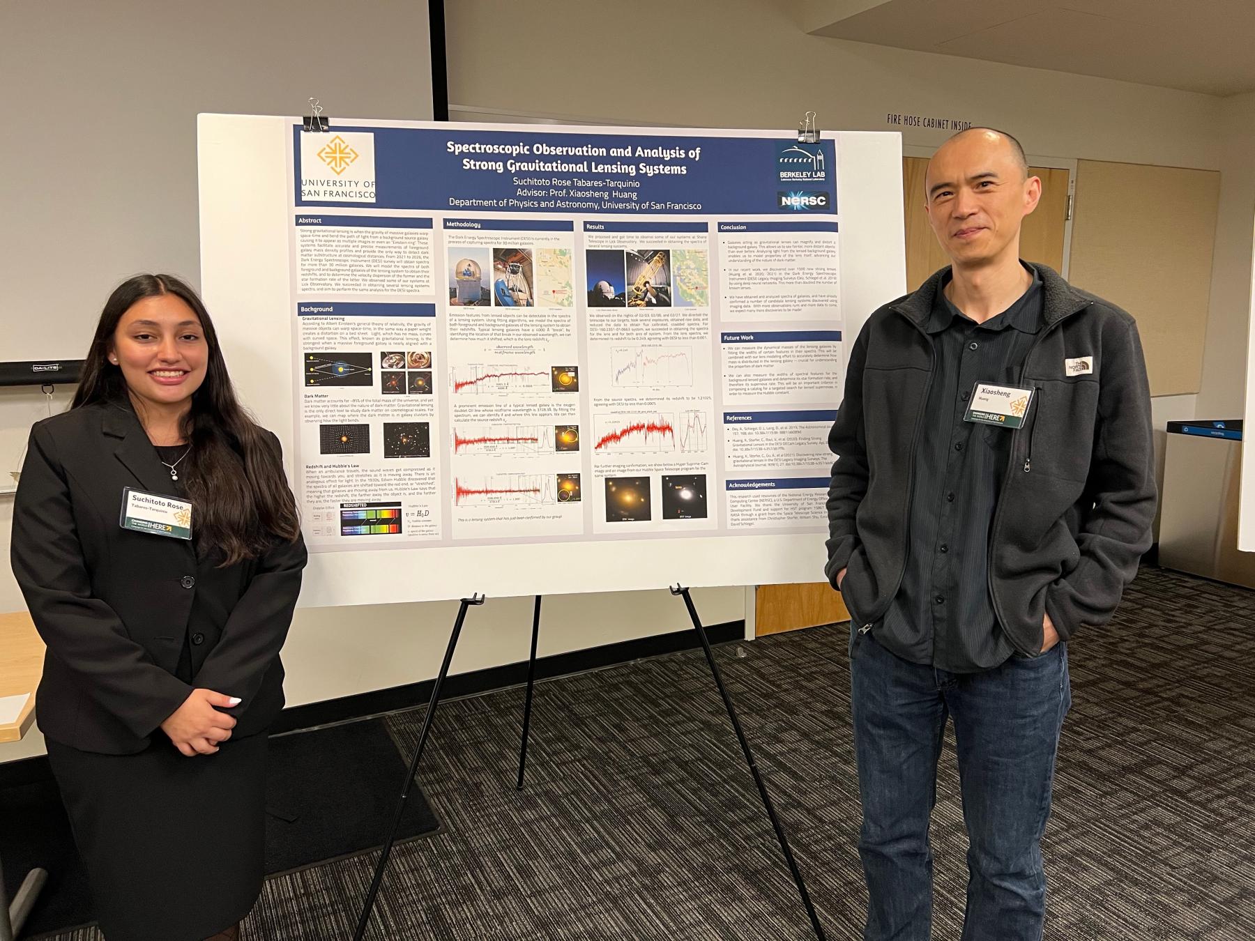 Rose and Professor Huang standing in front of their research poster on strong gravitational lensing