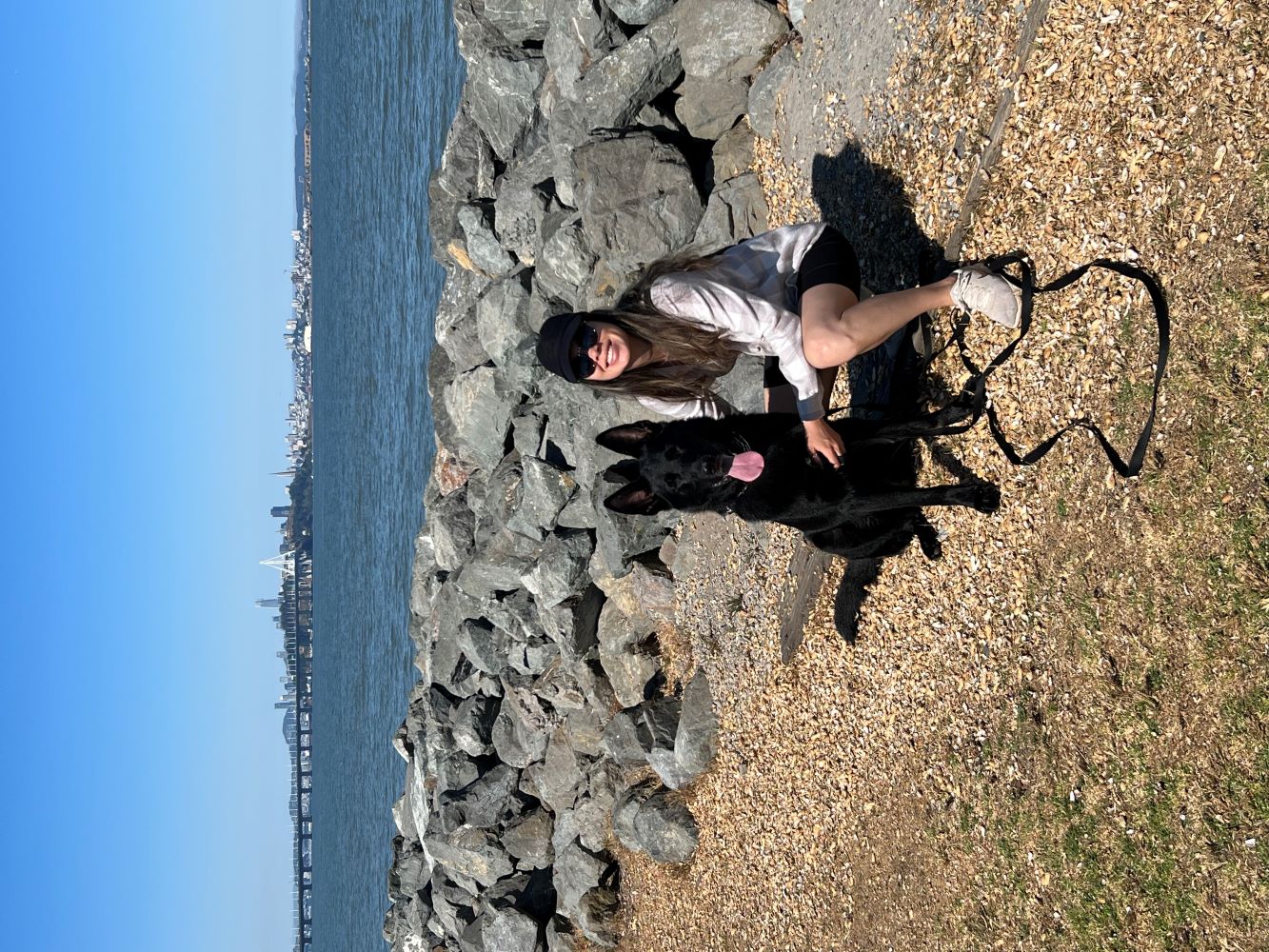 Woman with dog and an oceanview